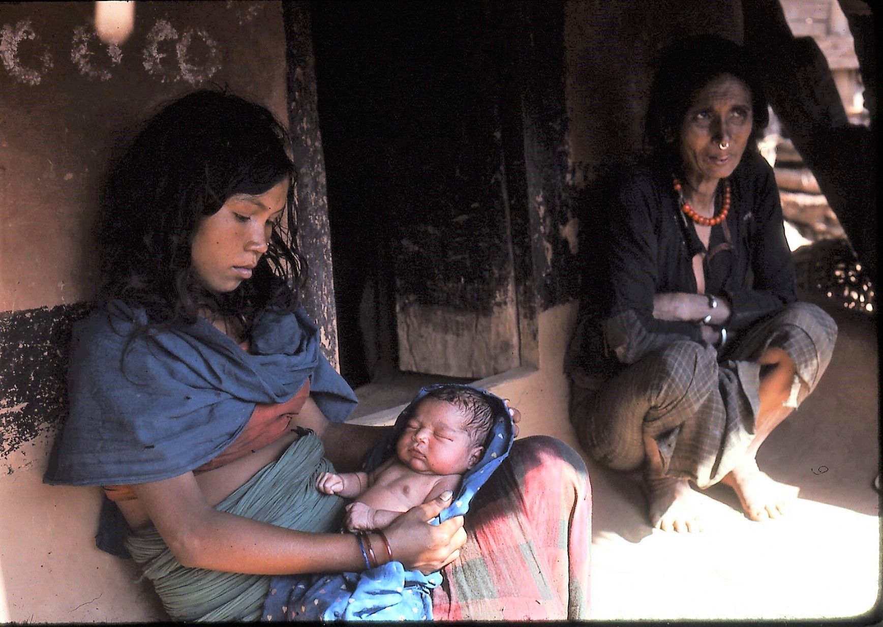 Sani with mother and baby